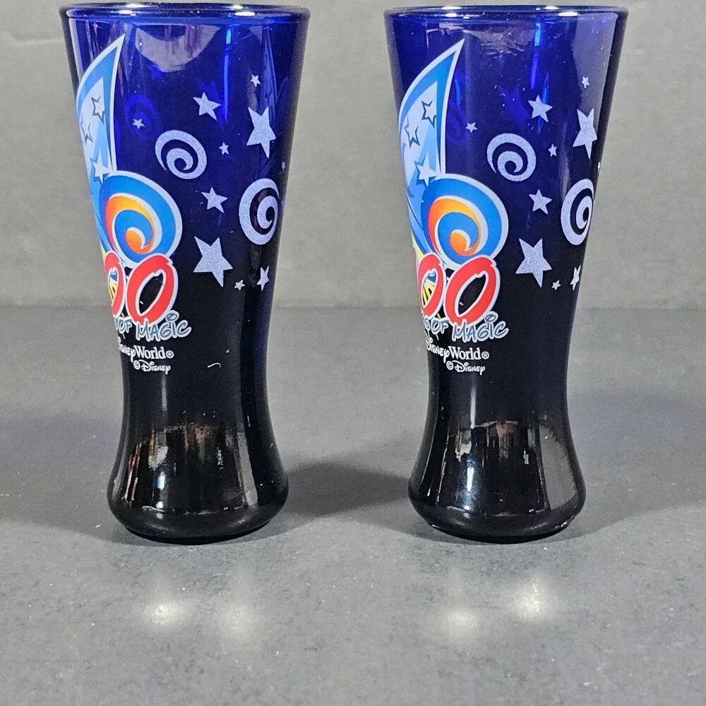 Vtg Set of 2 Walt Disney World 100 Years of Magic Cobalt Blue Shot Glasses 2001